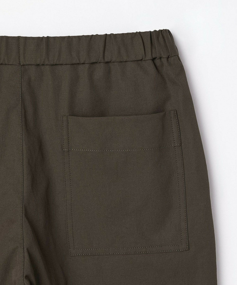L'EQUIPE ファンクショナルツイルパンツ キナリ